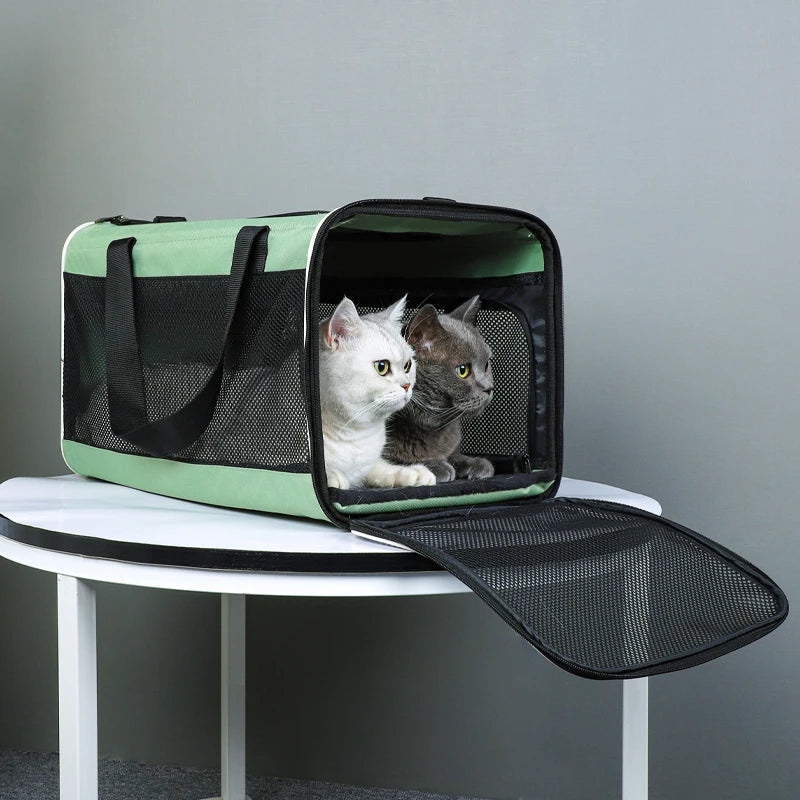 Portable pet carrier bag