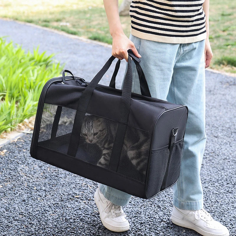Portable pet carrier bag